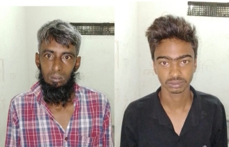 সোনাতলায় অটোভ্যান ছিনতাইয়ের সময় জনতার হতে আটক ২